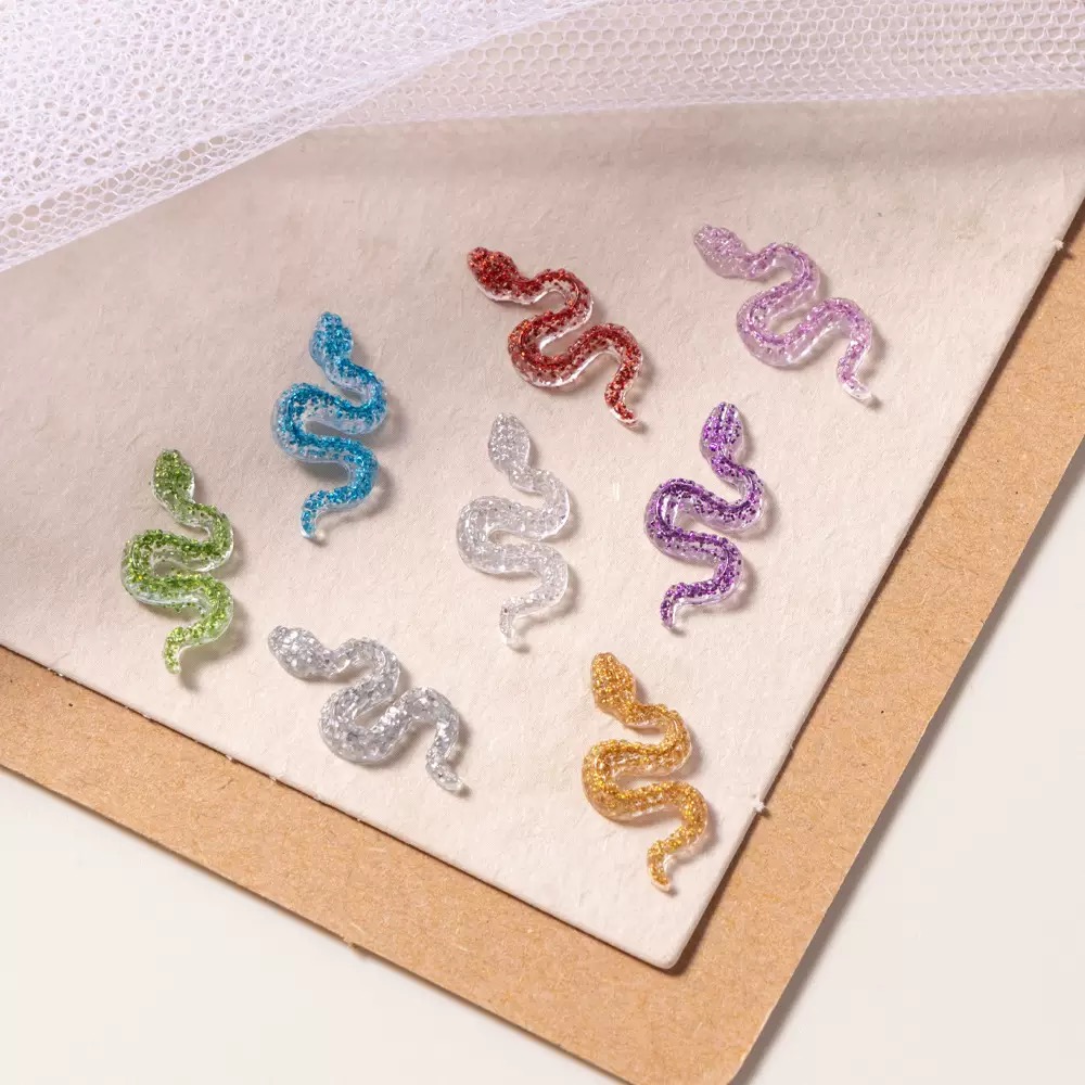 حليات راتنجية صغيرة لامعة على  - مراجعة Embellishment Glue Craft وسعره
